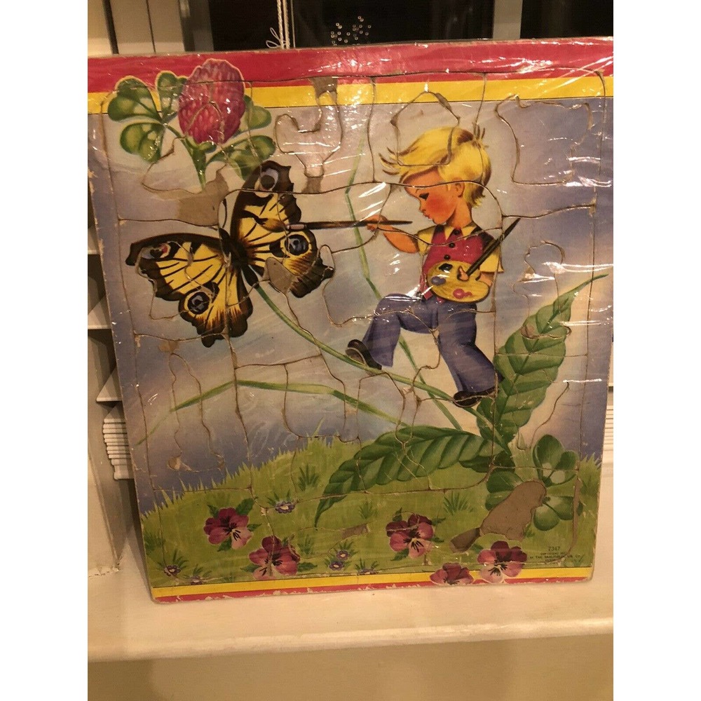 Vintage Puzzle Boy Painting Butterfly